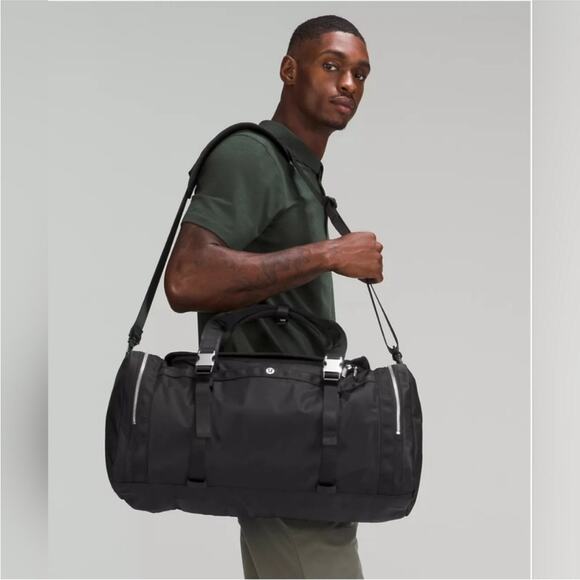NEW LULULEMON Black Silver Zip Wunderlust Travel Overnight Duffle Bag 40L Pocket - Picture 1 of 15